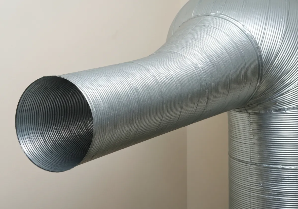 After — dryer vent cleaning: A lint-clogged dryer vent line cleared for safer, faster drying.